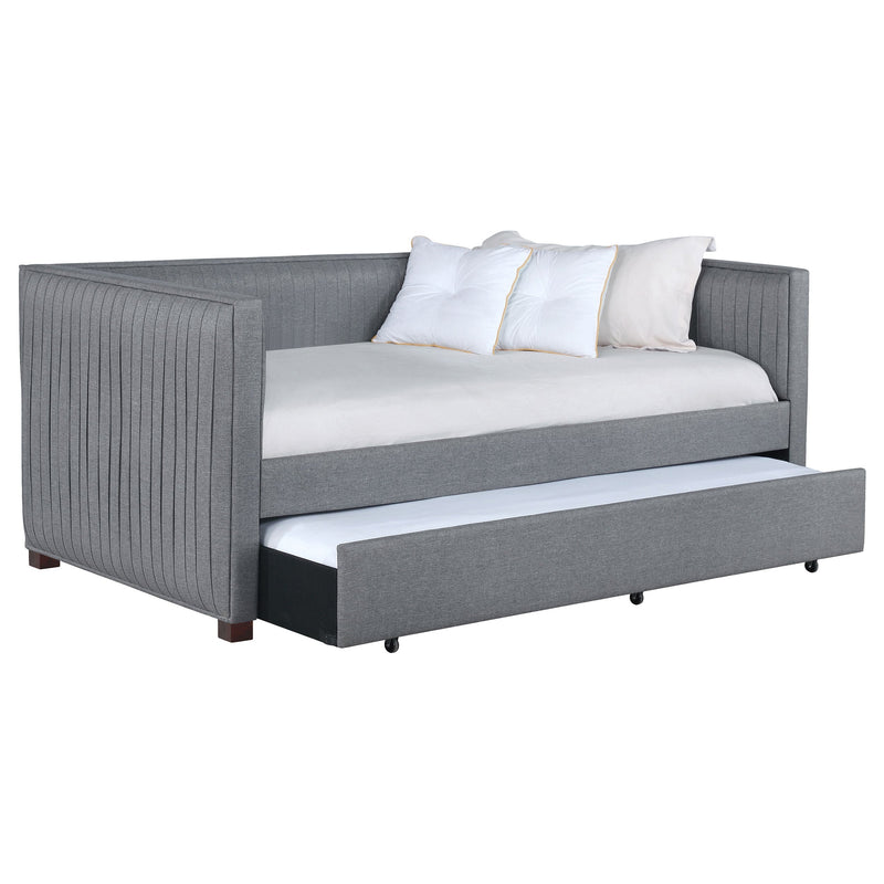 Cama de día individual tapizada Brodie con nido gris