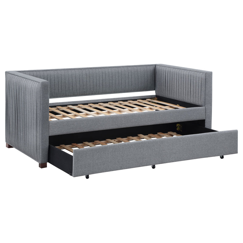 Cama de día individual tapizada Brodie con nido gris