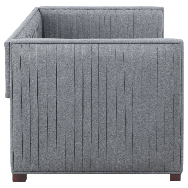 Cama de día individual tapizada Brodie con nido gris