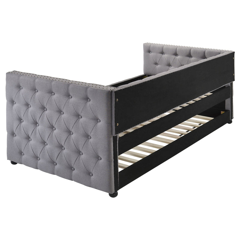 Cama de día individual tapizada Mockern con nido, gris