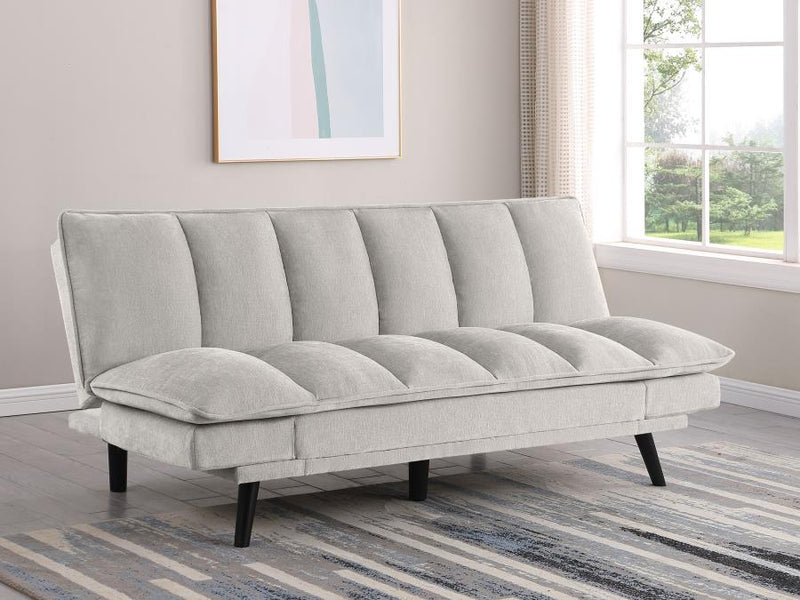 Sofá cama convertible tapizado Laredo con capitoné