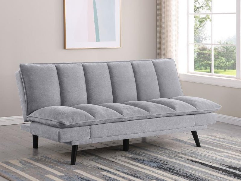 Sofá cama convertible tapizado Laredo con capitoné