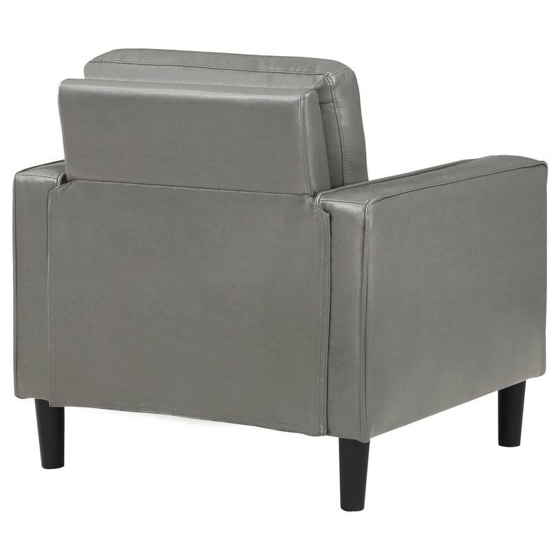 Sillón decorativo Ruth con reposabrazos tapizados