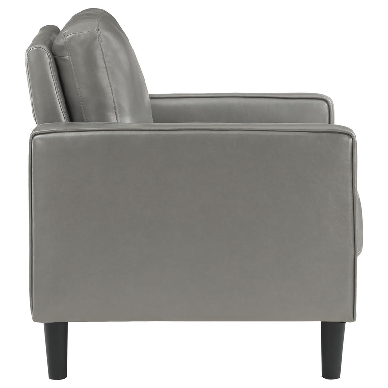 Sillón decorativo Ruth con reposabrazos tapizados