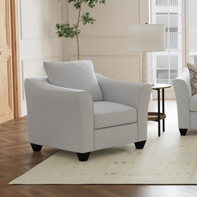 Sillón decorativo Salizar con brazos acampanados y tapizados