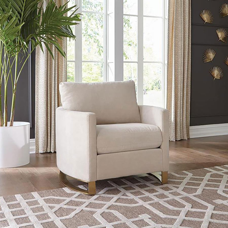 Sillón Corliss con reposabrazos curvos tapizado