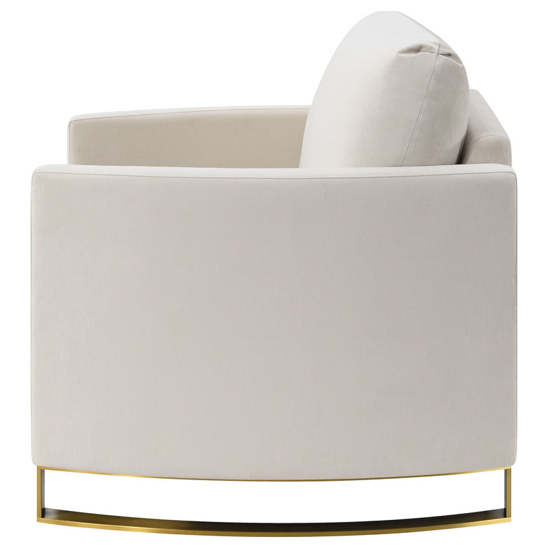 Sillón Corliss con reposabrazos curvos tapizado
