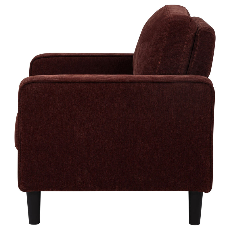 Sillón decorativo Ruth con reposabrazos tapizados