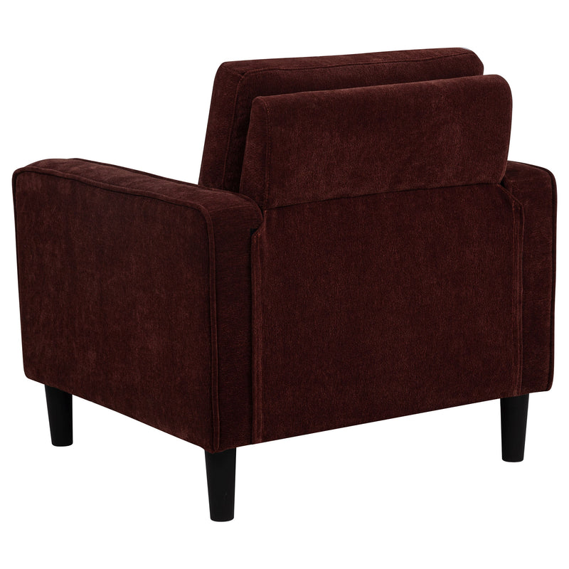 Sillón decorativo Ruth con reposabrazos tapizados