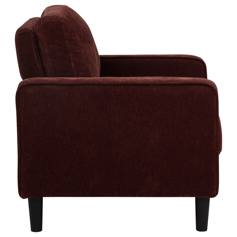 Sillón decorativo Ruth con reposabrazos tapizados