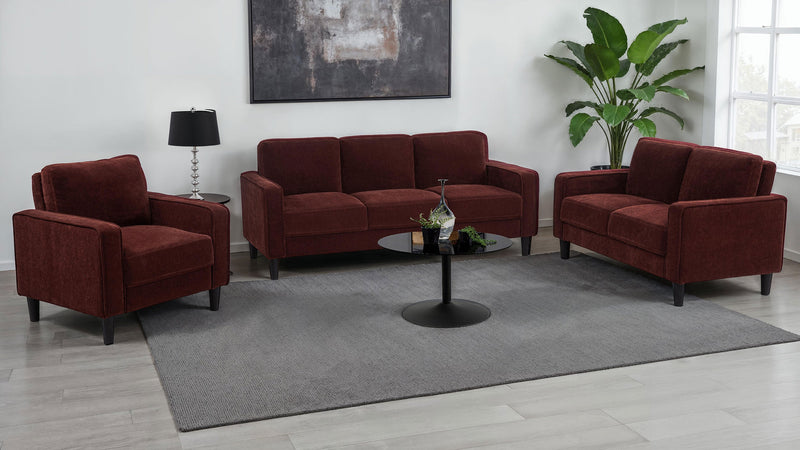 Sillón decorativo Ruth con reposabrazos tapizados