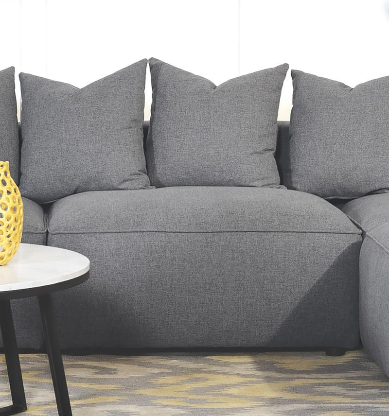 Sillón tapizado sin brazos Jennifer