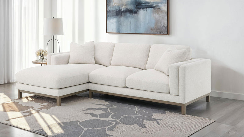 Sofá seccional chaise tapizado en bouclé Ginebra color arena
