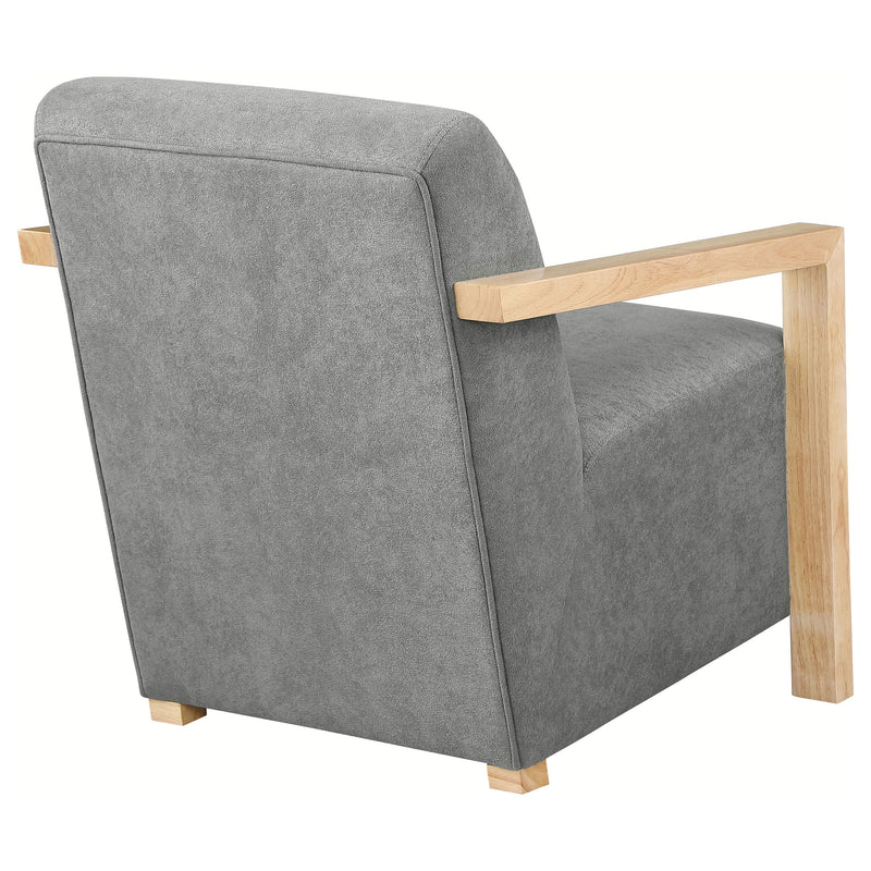 Sillón Diego tapizado con brazos de madera