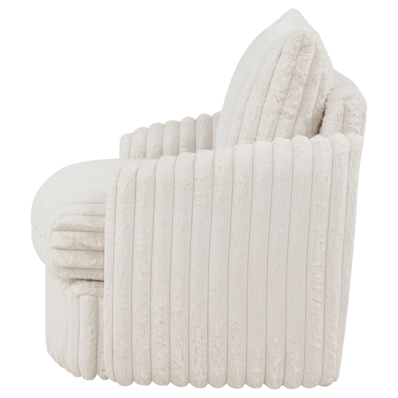 Sillón tapizado de pana Sarco con giro.