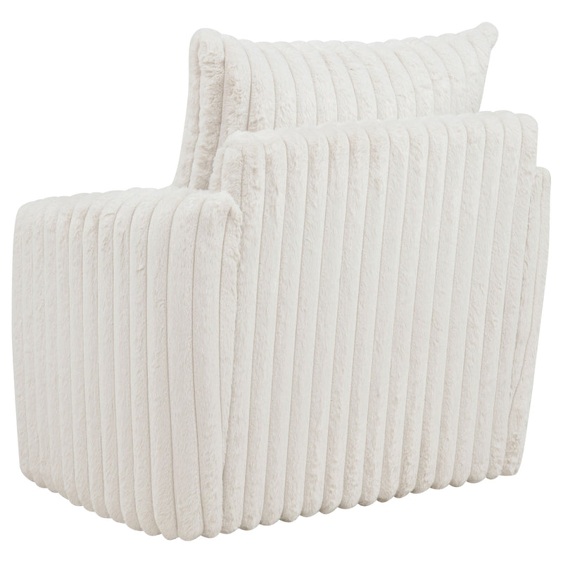 Sillón tapizado de pana Sarco con giro.
