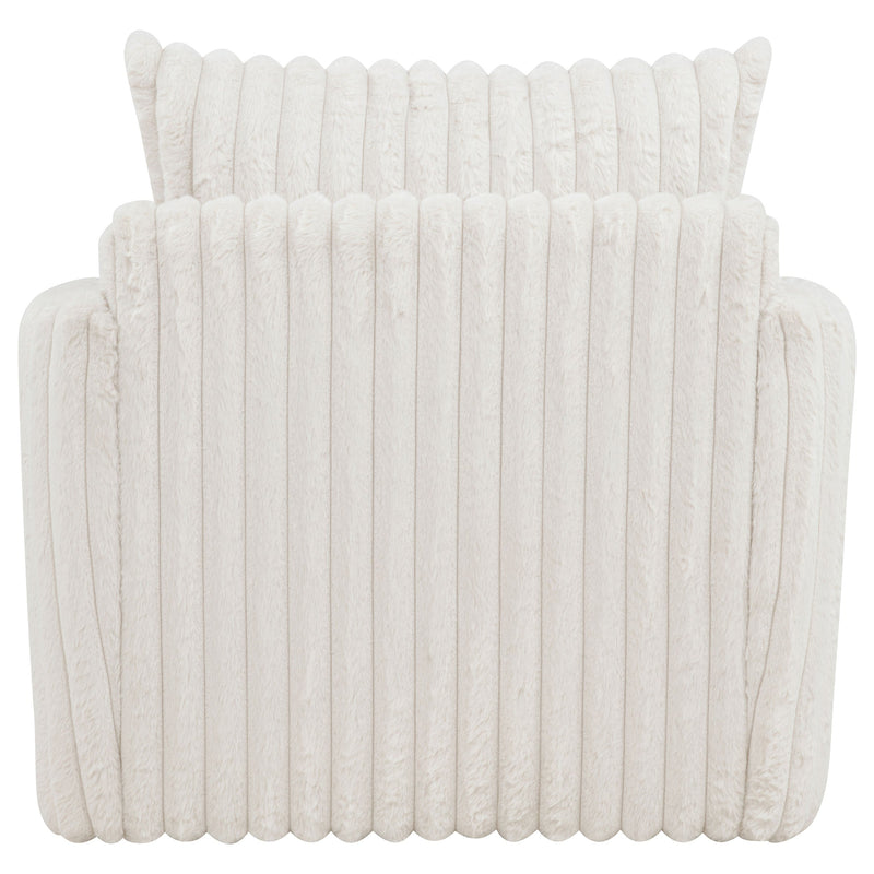 Sillón tapizado de pana Sarco con giro.