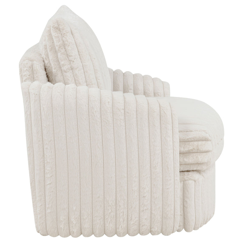Sillón tapizado de pana Sarco con giro.