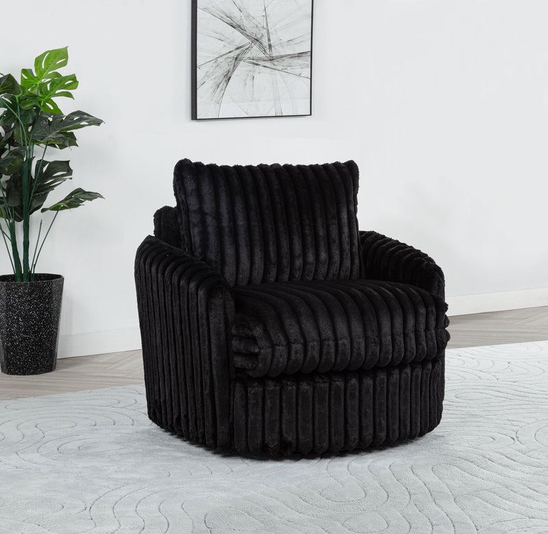 Sillón tapizado de pana Sarco con giro.