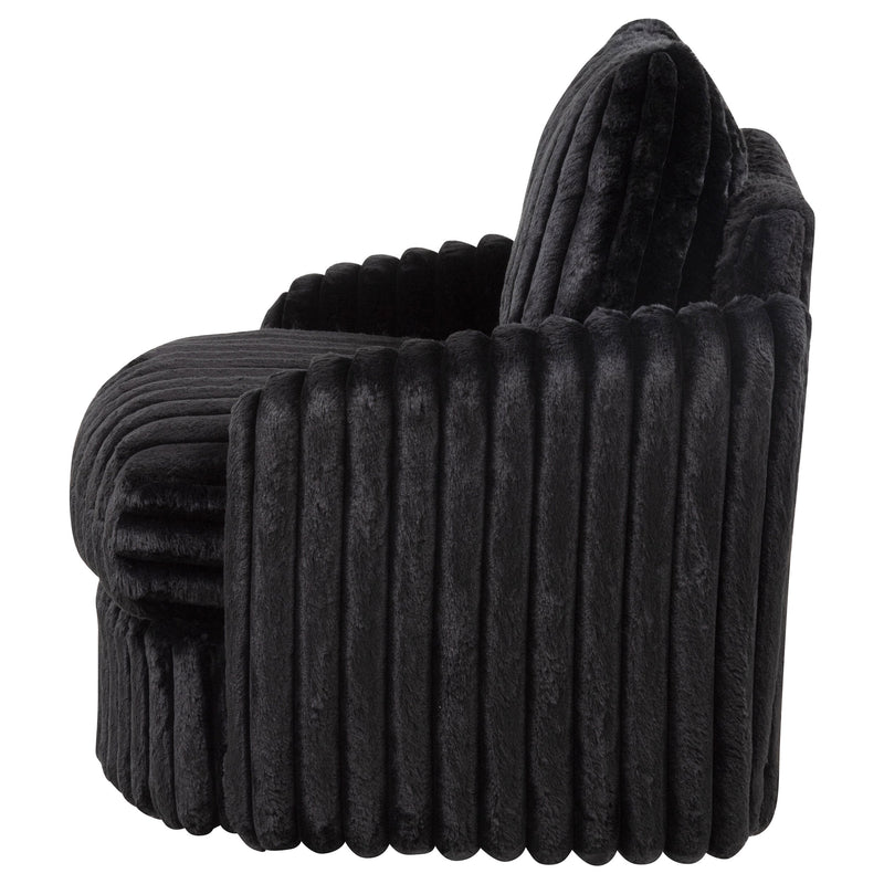 Sillón tapizado de pana Sarco con giro.