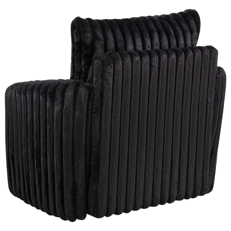Sillón tapizado de pana Sarco con giro.