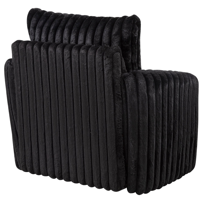 Sillón tapizado de pana Sarco con giro.
