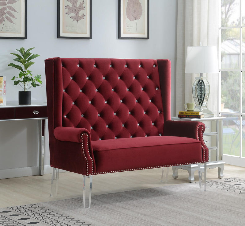 Sillón con respaldo alto, tapizado en terciopelo negro y patas de acrílico
