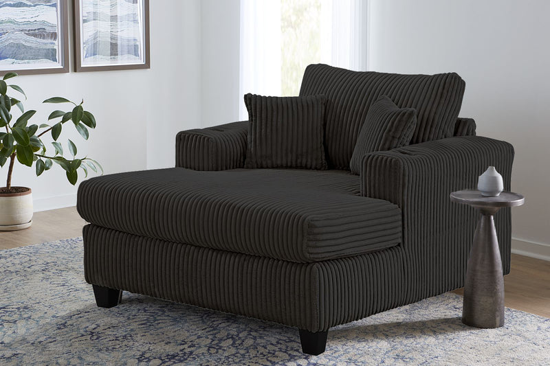 Chaise longue negra grande con 2 portavasos