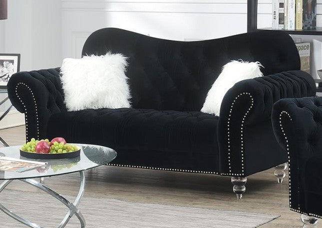Tumbona Capella negra con patas acrílicas Colección Living