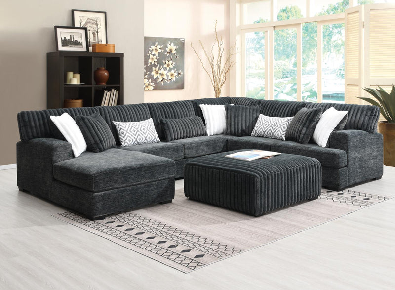Colección Doyline de sala de estar seccional gris carbón
